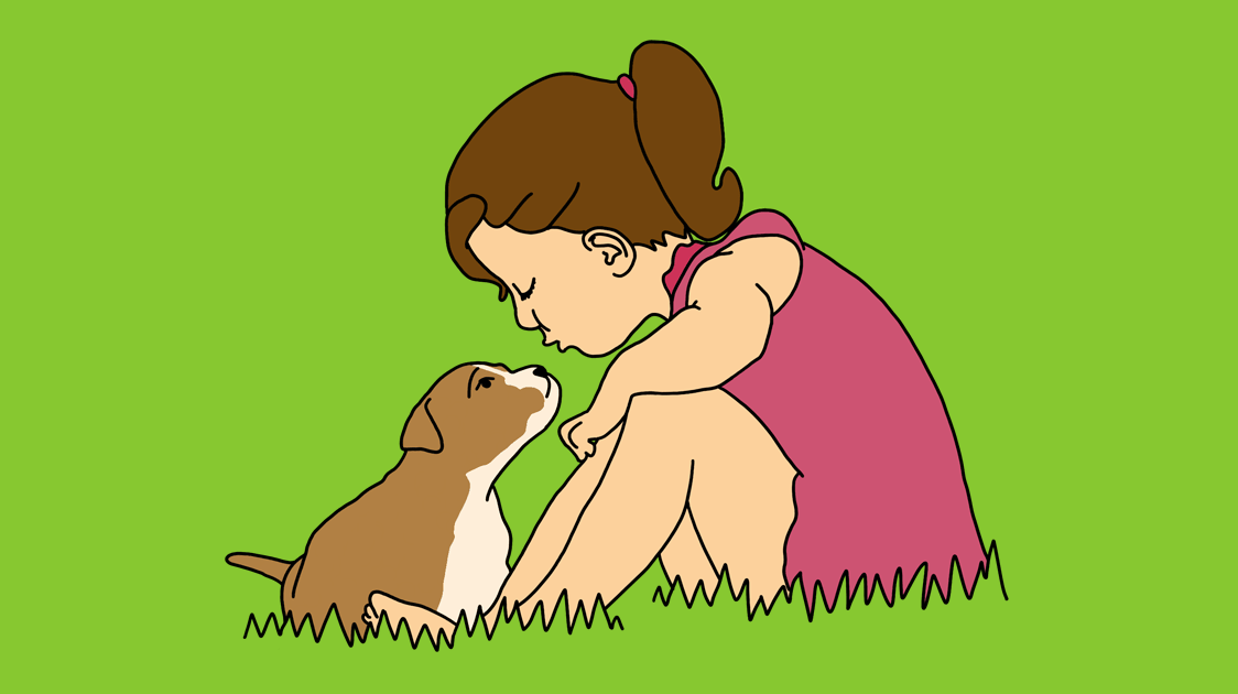 Child embracing dog